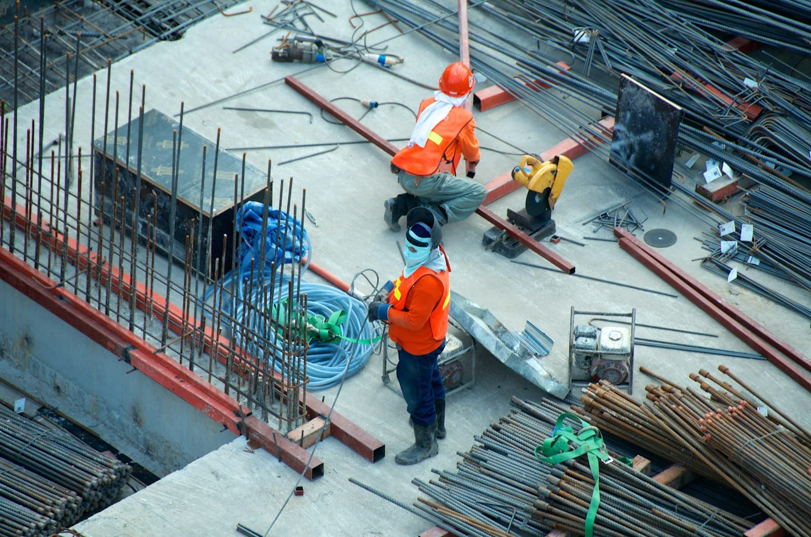 Roofing contractor inspecting a residential roof